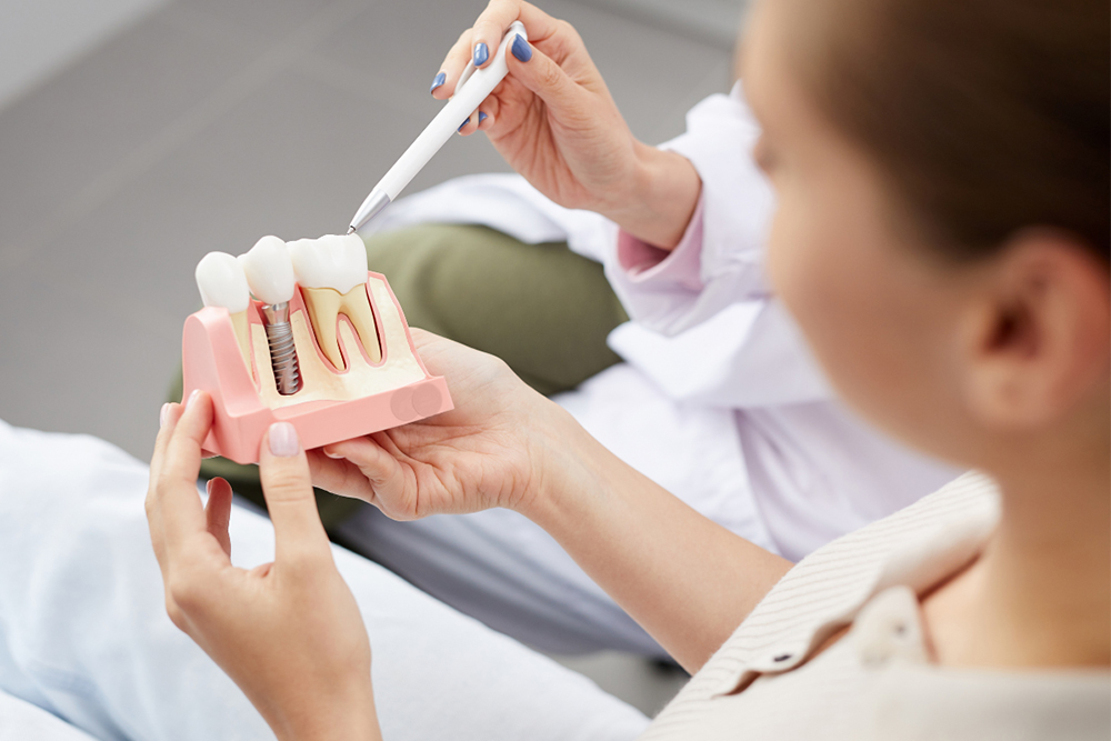 Dental implants comparison with dentures at Vellore Corners Dentistry